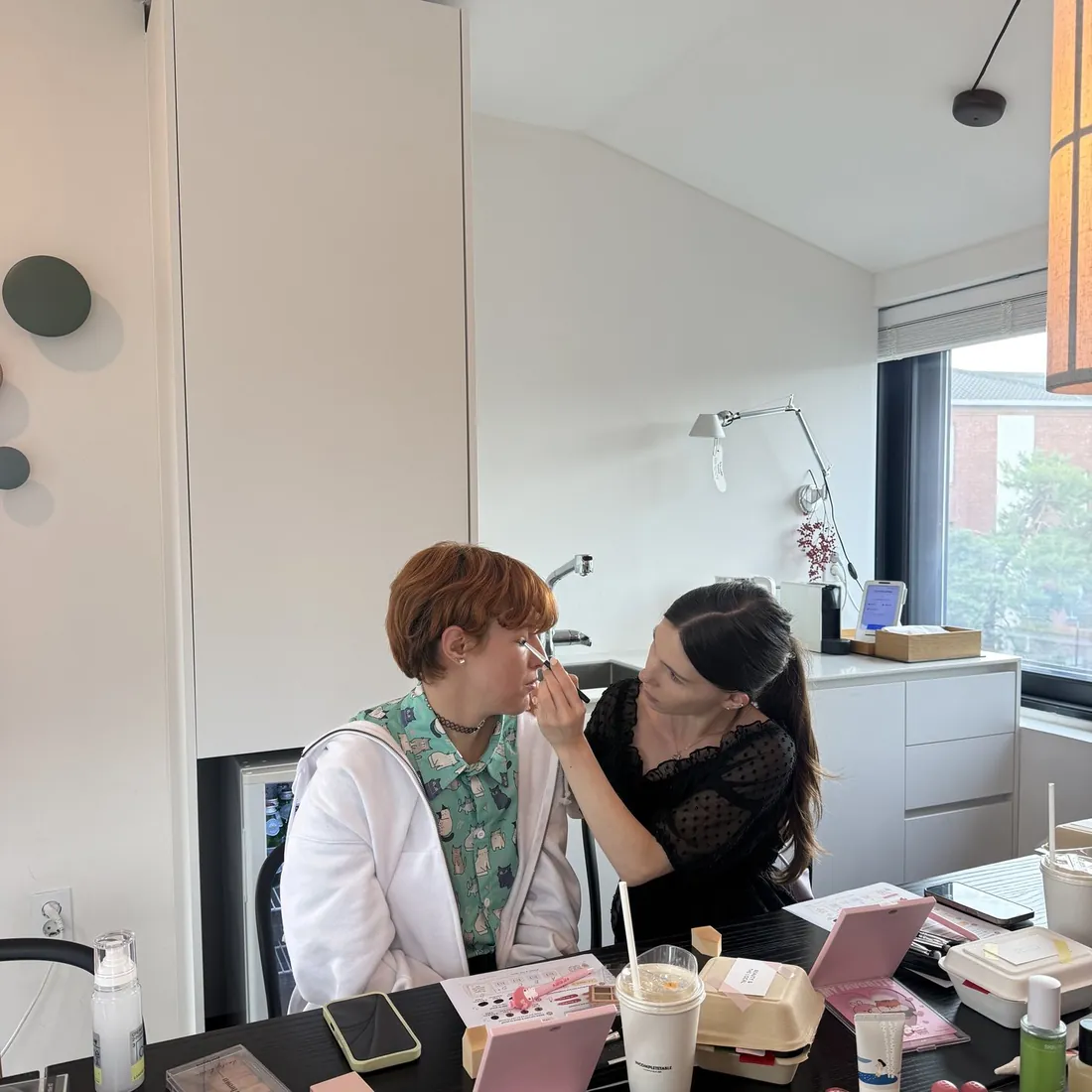 A guest having her colours applied during the makeup trial